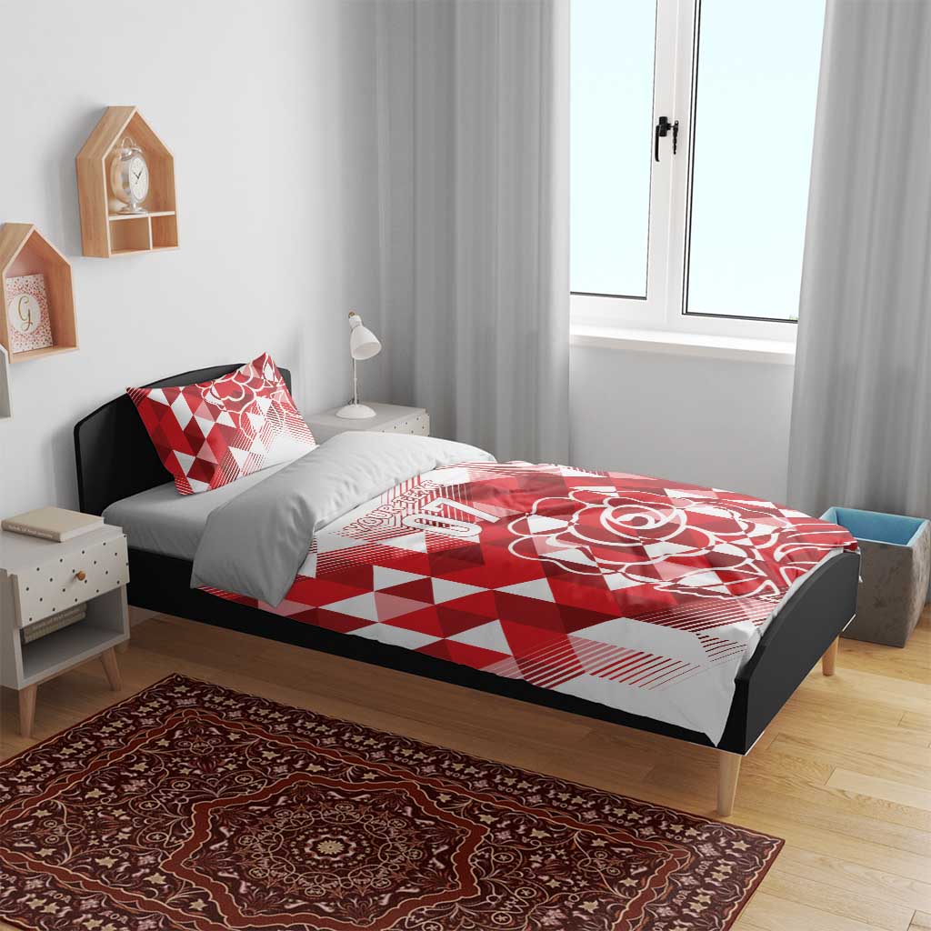 Red and white bedding set with geometric check design, rose artwork, and 07 on duvet