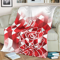 Red and white rose graphic custom blanket with YOUR TEXT 07 over couch