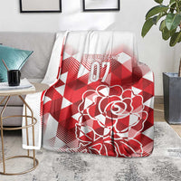 Red and white custom blanket with geometric pattern and floral rose graphic on white