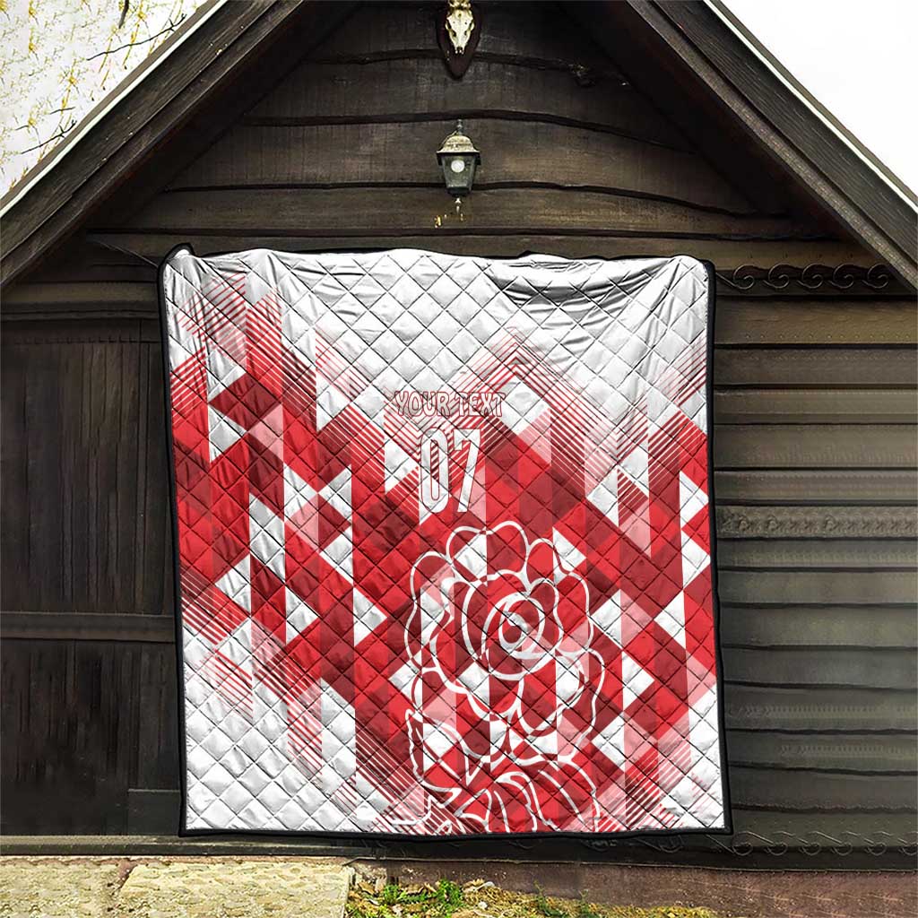 White and red quilt with quilted texture, red chevron pattern, rose graphic, and “07”