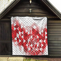 White and red quilt with quilted texture, red chevron pattern, rose graphic, and “07”
