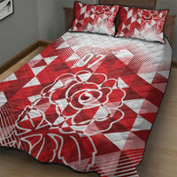 Red and white quilt bed set with oversized rose motif and '07' on quilt, 2 pillows
