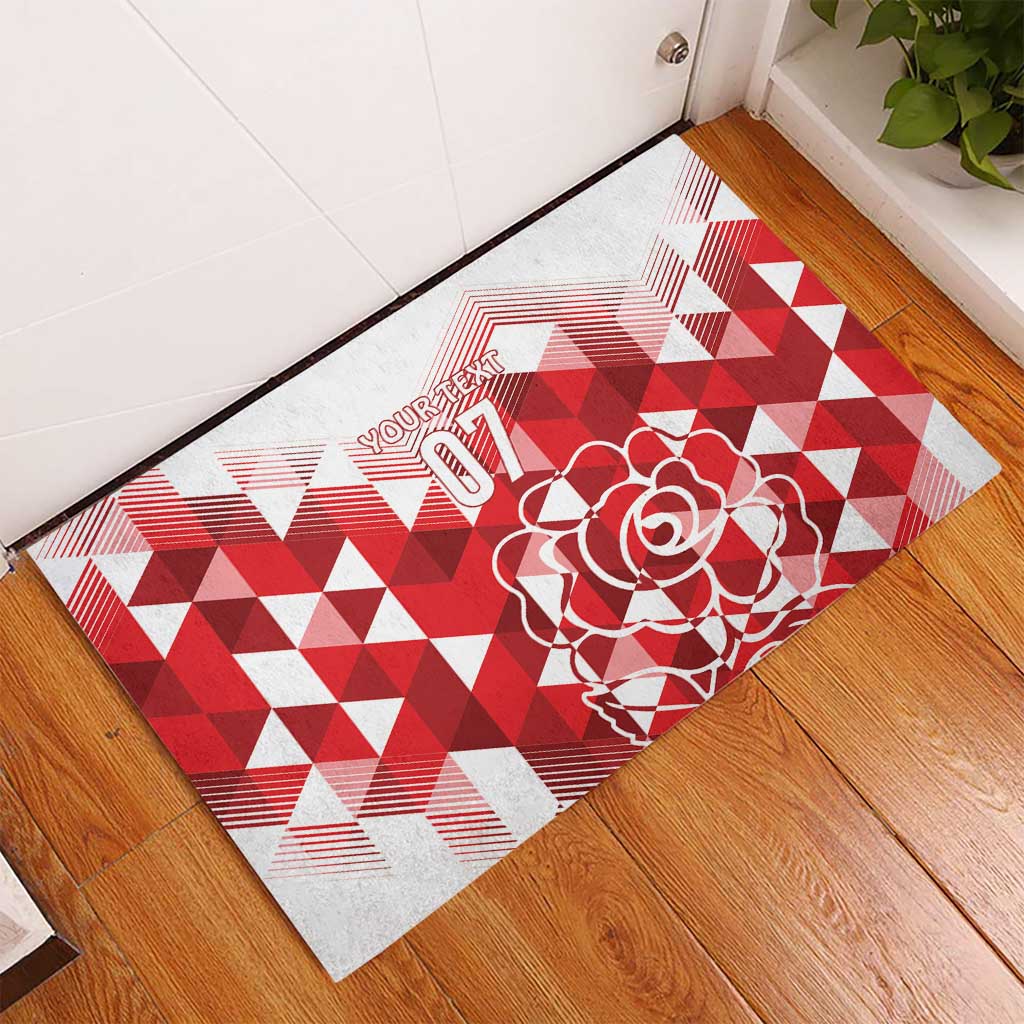 Red and white rubber doormat with rose outline, 'YOUR TEXT' and '07' numerals