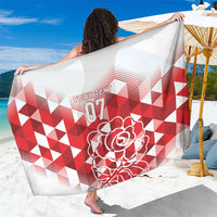 White sarong with red geometric squares, rose graphic and '07' print