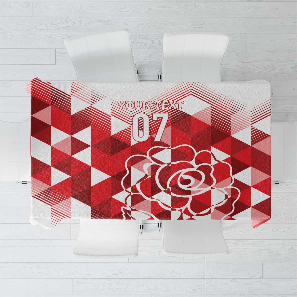 Red and white geometric tablecloth with rose graphic and '07' emblem