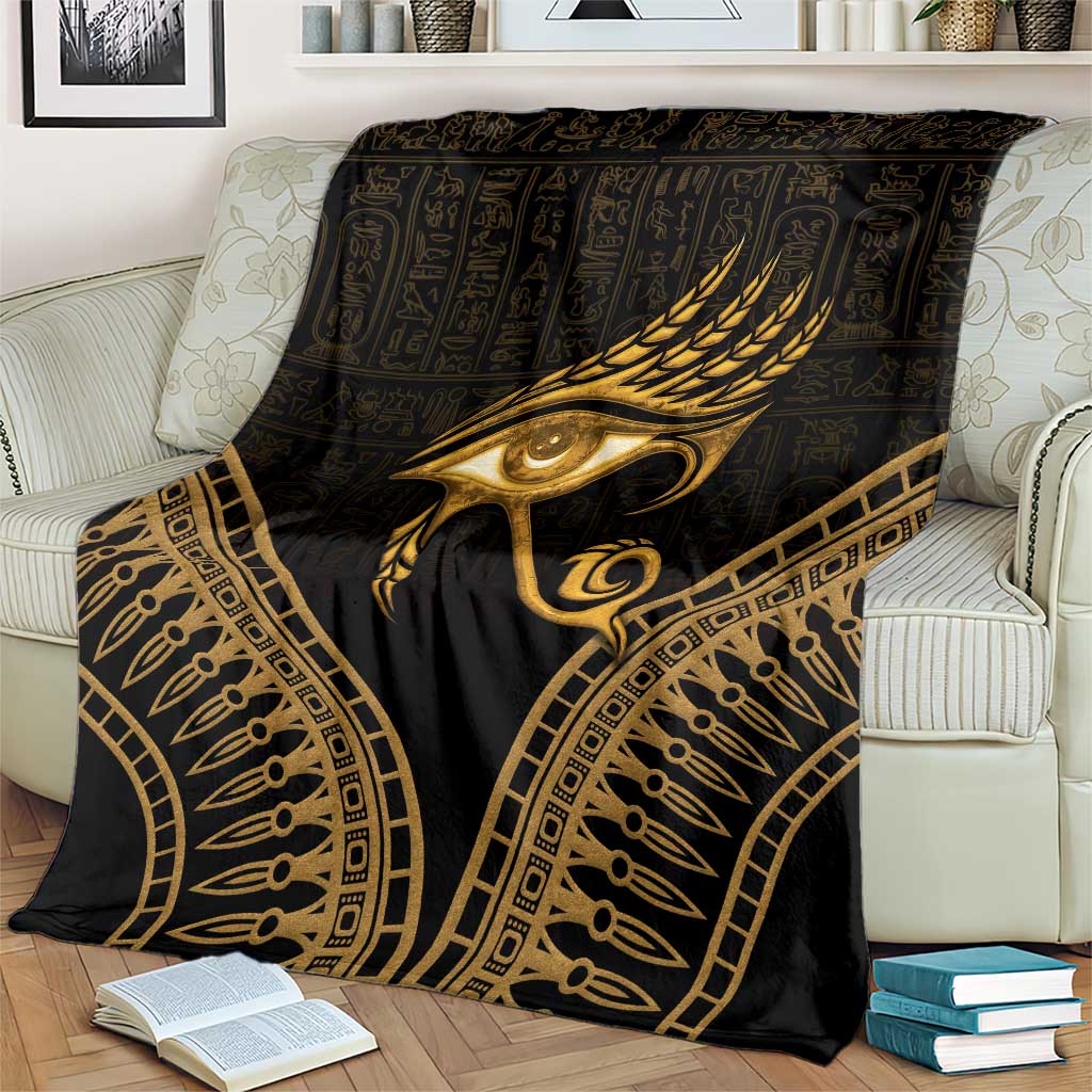 Black and gold Eye of Horus blanket with arched ornate border pattern