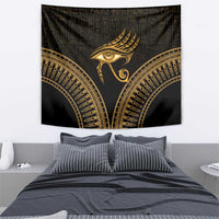 Black and gold Eye of Horus wall tapestry with central feathered eye and arched gold lines
