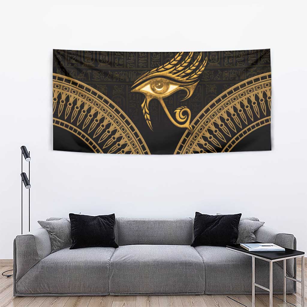 Black and gold Eye of Horus tapestry with feathered eye detail and gold patterned arch