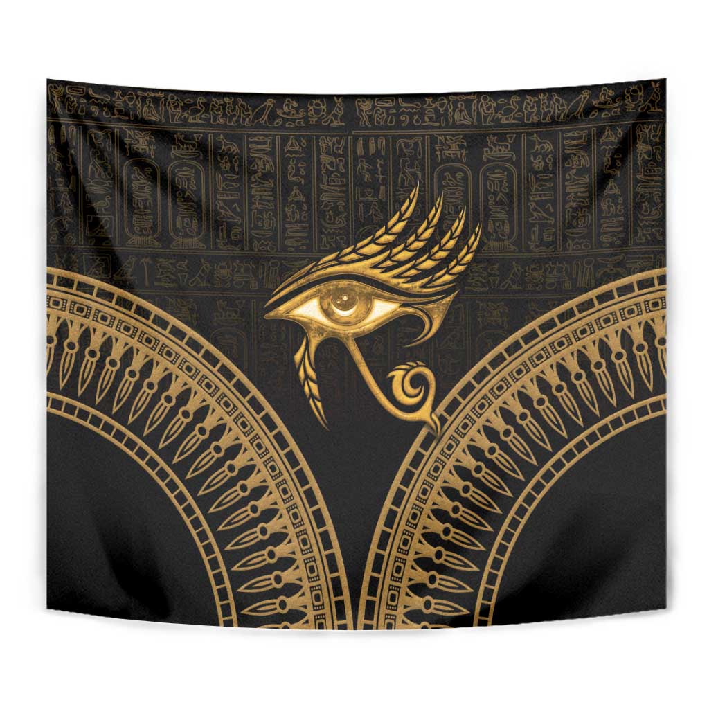 Black and gold Eye of Horus tapestry close-up, feathered eye emblem with gold ornament