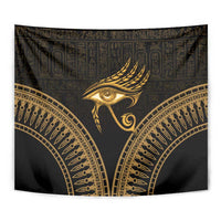 Black and gold Eye of Horus tapestry close-up, feathered eye emblem with gold ornament