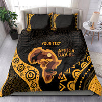 Personalized bedding set on bed: black and gold ethnic patterns with pillows and “YOUR TEXT”