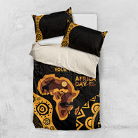Personalized bedding set shown laid out: black base, gold trim patterns, “YOUR TEXT”