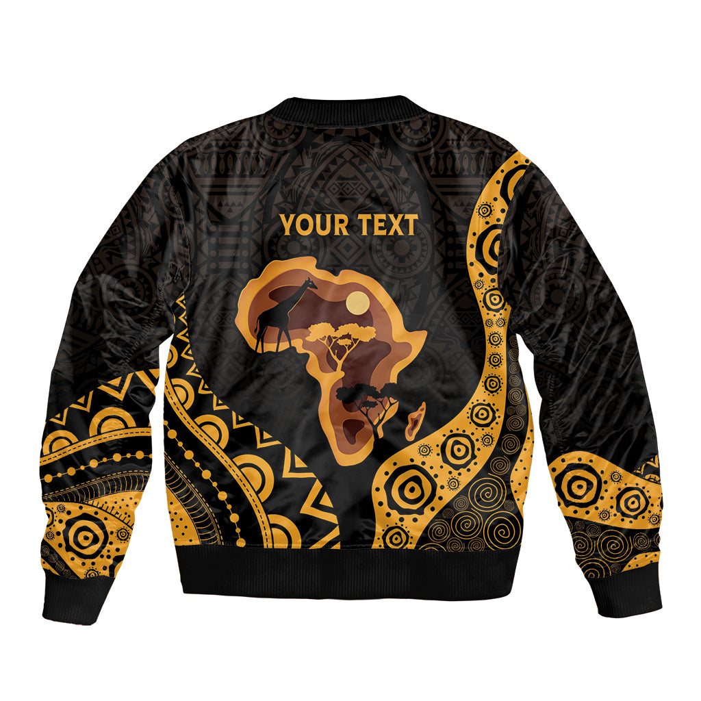 Black bomber jacket with gold circular patterns, giraffe tree graphic and 'YOUR TEXT' panel