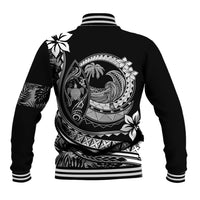 Black varsity baseball jacket, back view with white striped ribbed cuffs and tropical plumeria print