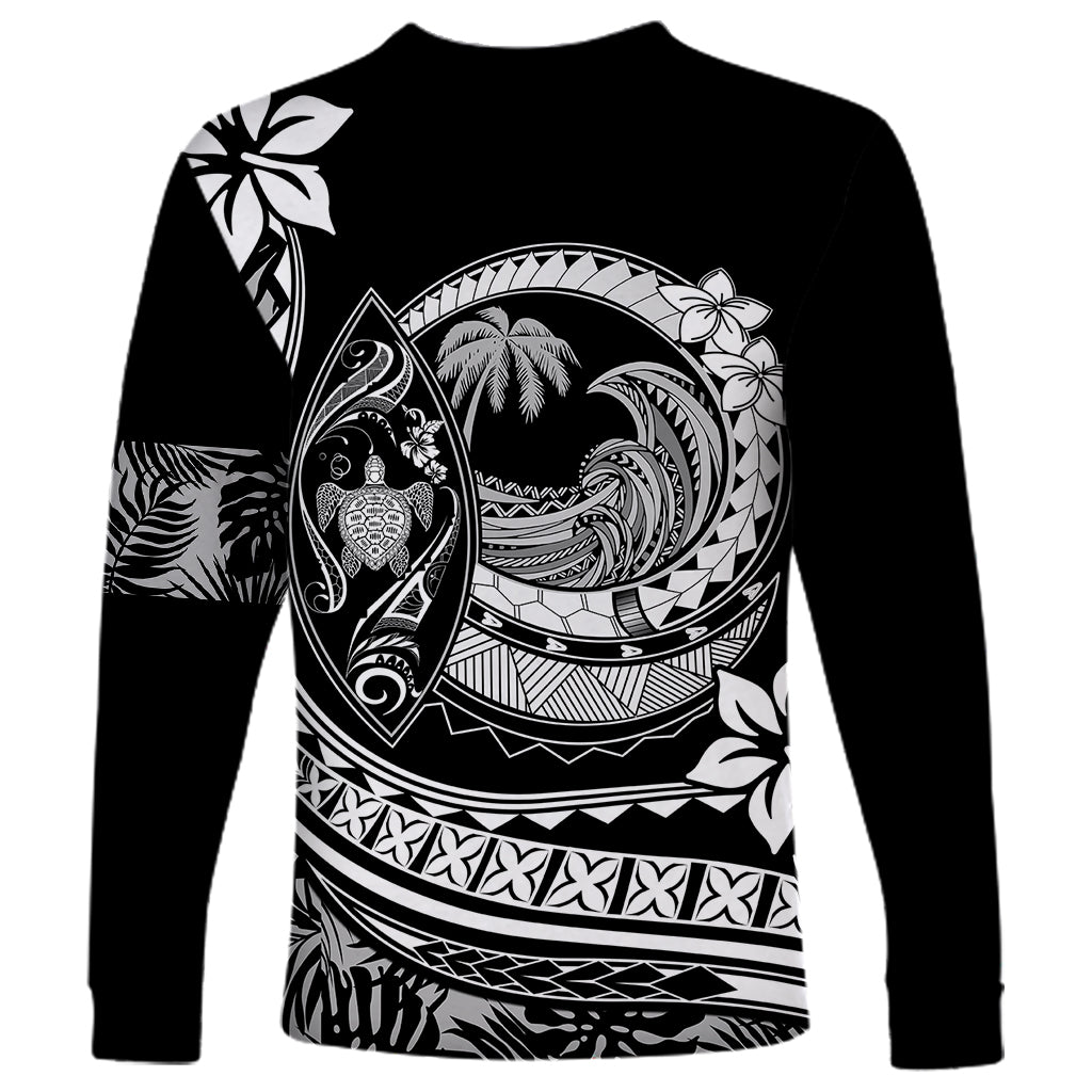 Unisex black long-sleeve shirt with bold Polynesian wave, turtle and plumeria-style print
