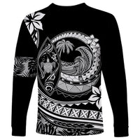 Unisex black long-sleeve shirt with bold Polynesian wave, turtle and plumeria-style print