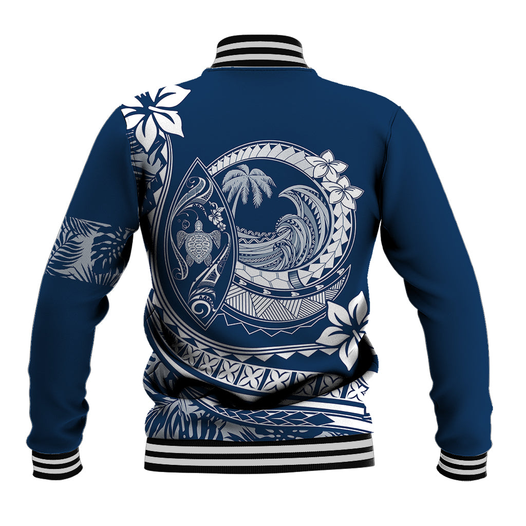 Back view: navy baseball jacket with striped cuffs and tropical wave plumeria graphic