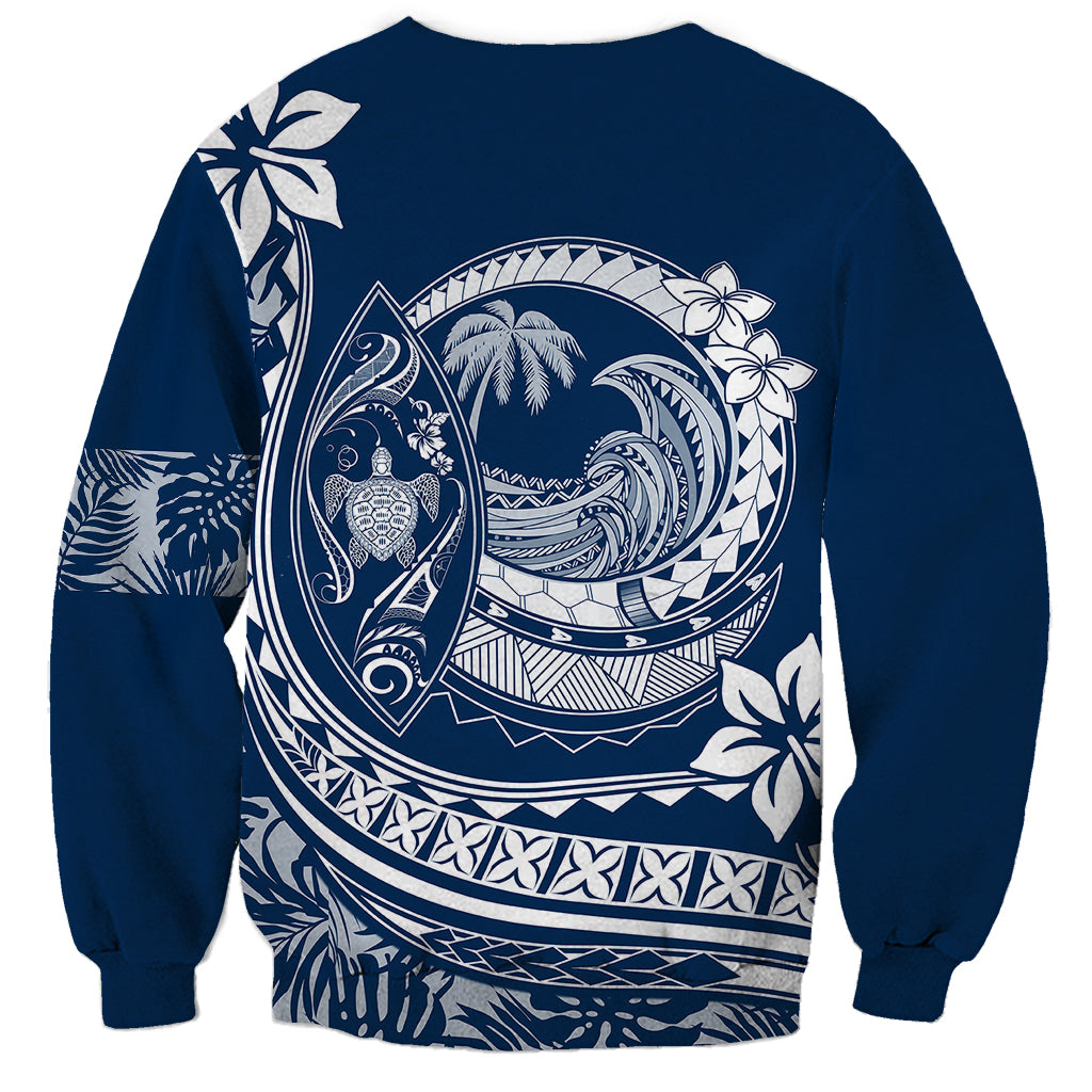 Navy blue unisex sweatshirt with large white Polynesian wave and floral graphic