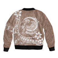 Beige unisex bomber jacket back with large circular Polynesian design, black rib hem and cuffs
