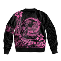 Black bomber jacket with pink Polynesian plumeria graphic on back