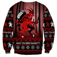 Unisex black Christmas sweatshirt with red Krampus graphic and “Have you been naughty?” text