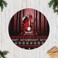 Black Christmas tree skirt with red Krampus print and 'Merry Krampus' text.