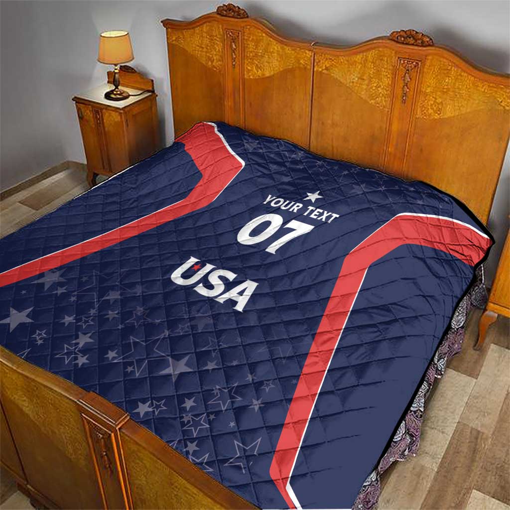 Blue quilt over bedspread with red accents, your text 07, and USA center graphic