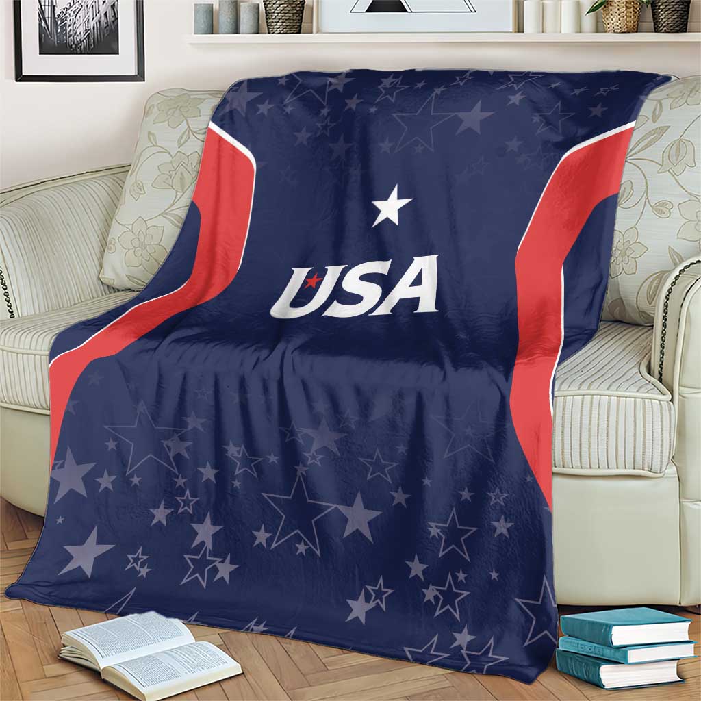 Navy USA-themed blanket with red/white flag stripes and stars, draped on sofa