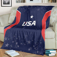 Navy USA-themed blanket with red/white flag stripes and stars, draped on sofa