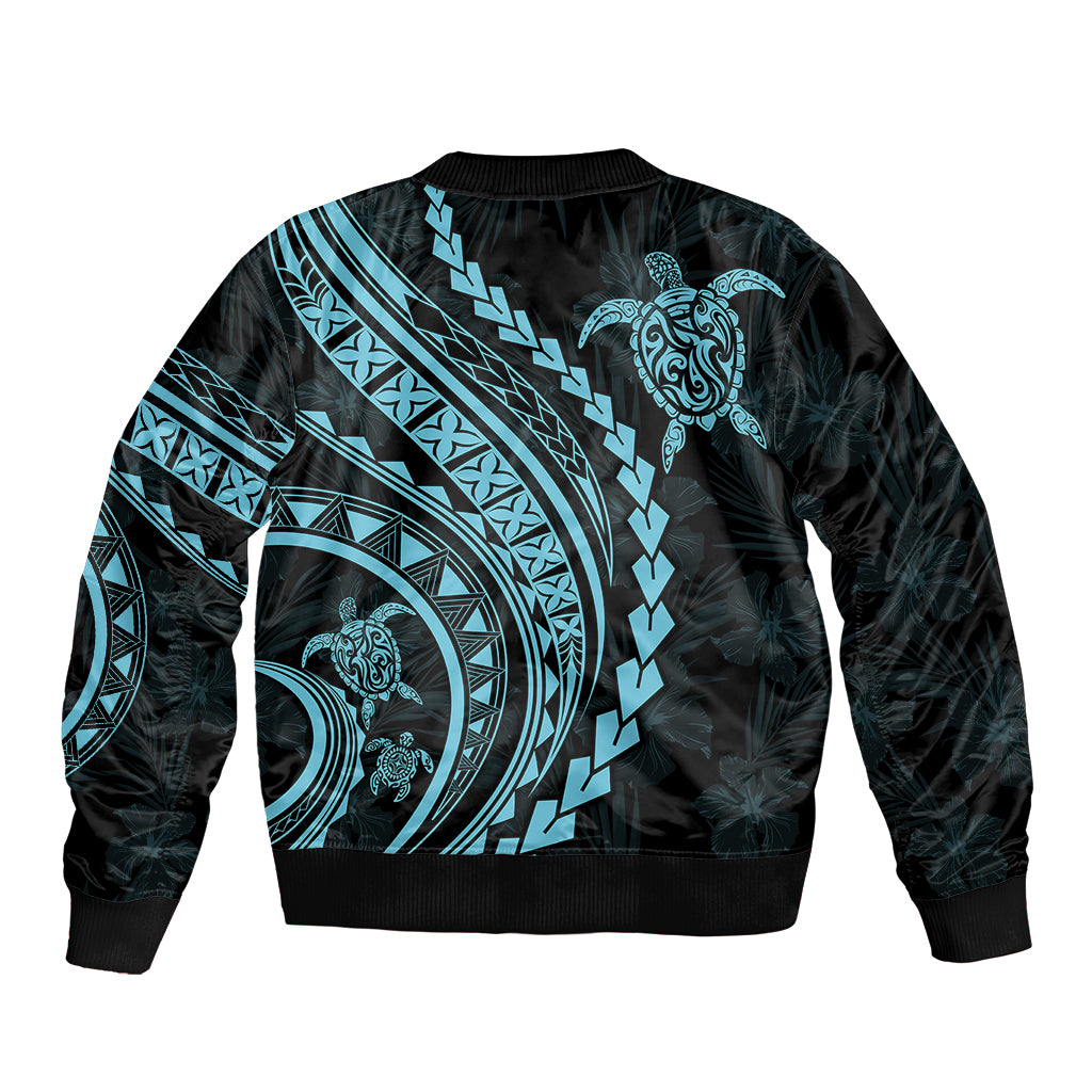 Black bomber jacket with aquamarine tribal turtle graphic on back, ribbed collar and cuffs
