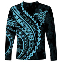 Long-sleeve shirt with aquamarine geometric bands and turtle motif on black fabric