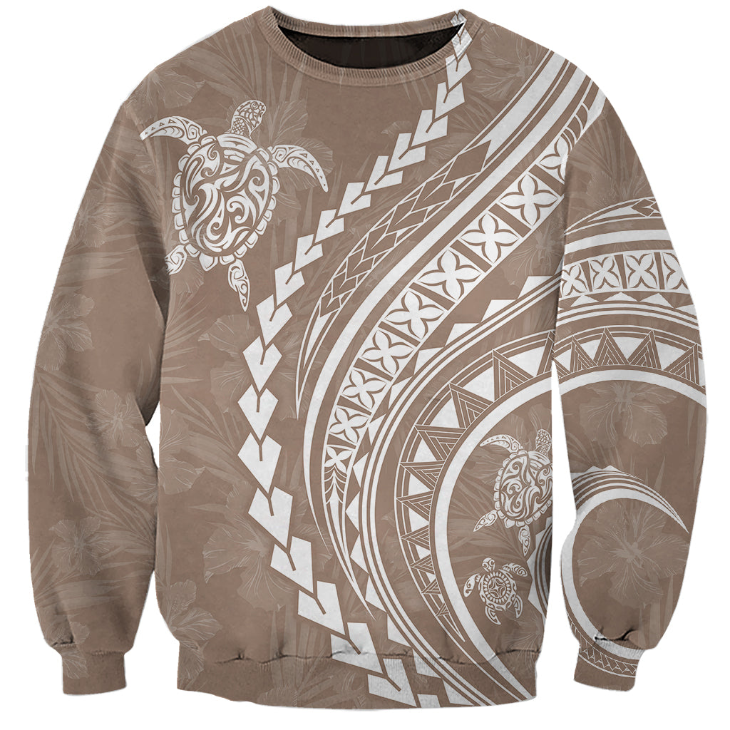 Beige unisex sweatshirt with white Polynesian turtle and hibiscus graphic, crew neck