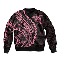 Black unisex bomber jacket back with pink Polynesian tribal patterns and turtle graphic