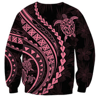 Unisex sweatshirt with dark base and pink Polynesian geometric pattern with turtle motifs