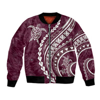 Maroon bomber jacket with front zipper, ribbed cuffs, and white tribal sleeve artwork