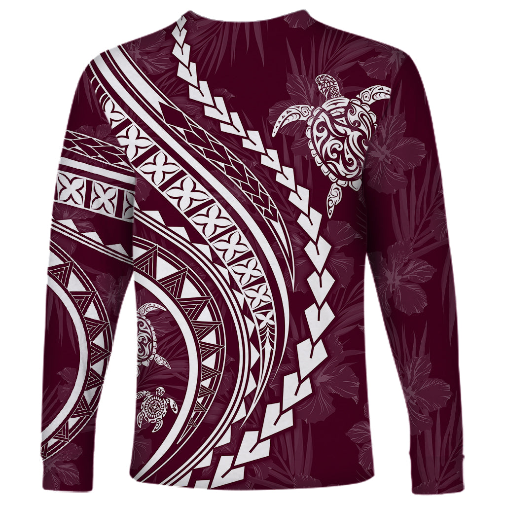 Dark maroon long-sleeve shirt with bold white circular tribal pattern and turtle