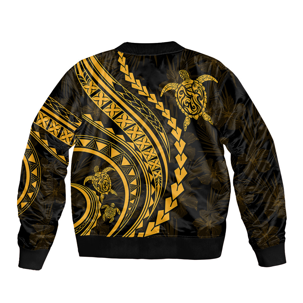 Black bomber jacket with gold tribal back graphic and ribbed hem, long sleeves