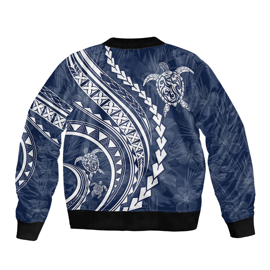 Navy bomber jacket with turtle and tribal wave print, black ribbed hem and cuffs