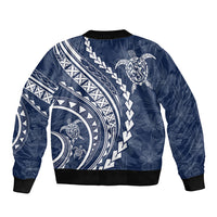 Navy bomber jacket with turtle and tribal wave print, black ribbed hem and cuffs