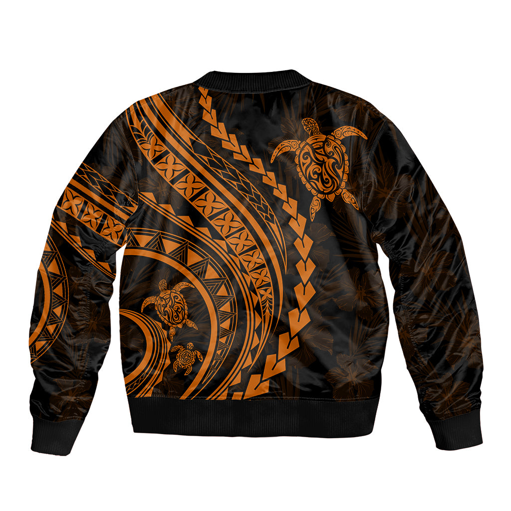 Black bomber jacket with orange tribal back graphic and wide banded hem