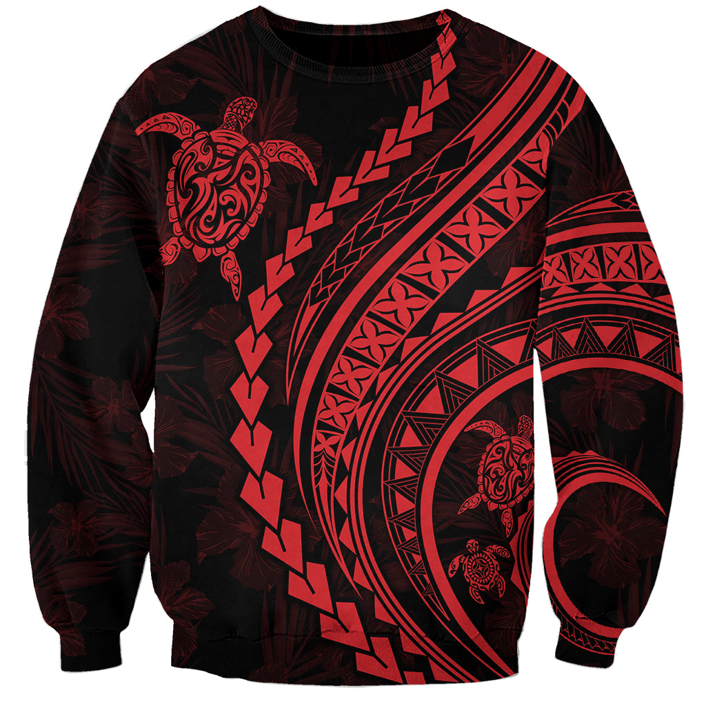 Dark sweatshirt with red Polynesian turtle and hibiscus print, crew neck.