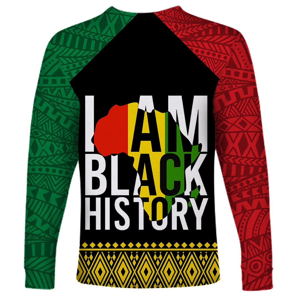 Long-sleeve raglan shirt with black body, green left and red right patterned sleeves, front graphic