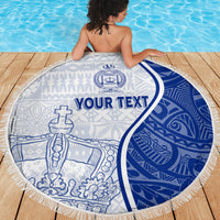 Round beach blanket on wooden deck, white and blue patterned print with custom text