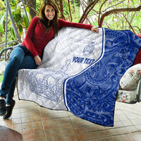 White and blue personalized quilt with crown and anchor graphics and “YOUR TEXT” in the center