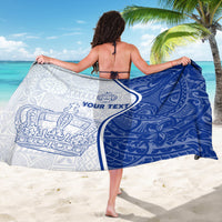 Blue and white patterned personalized sarong with tie straps, crest and text shown