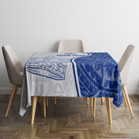 Blue and white patterned tablecloth on round table with chair set