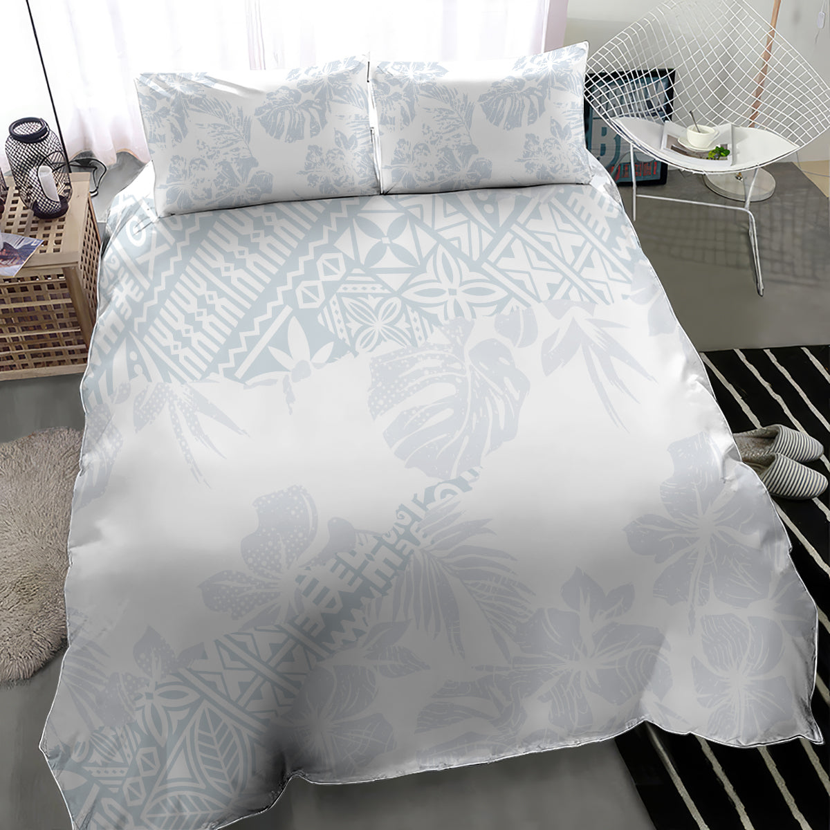 White duvet cover with light blue hibiscus/leaf print and matching 2 pillowcases