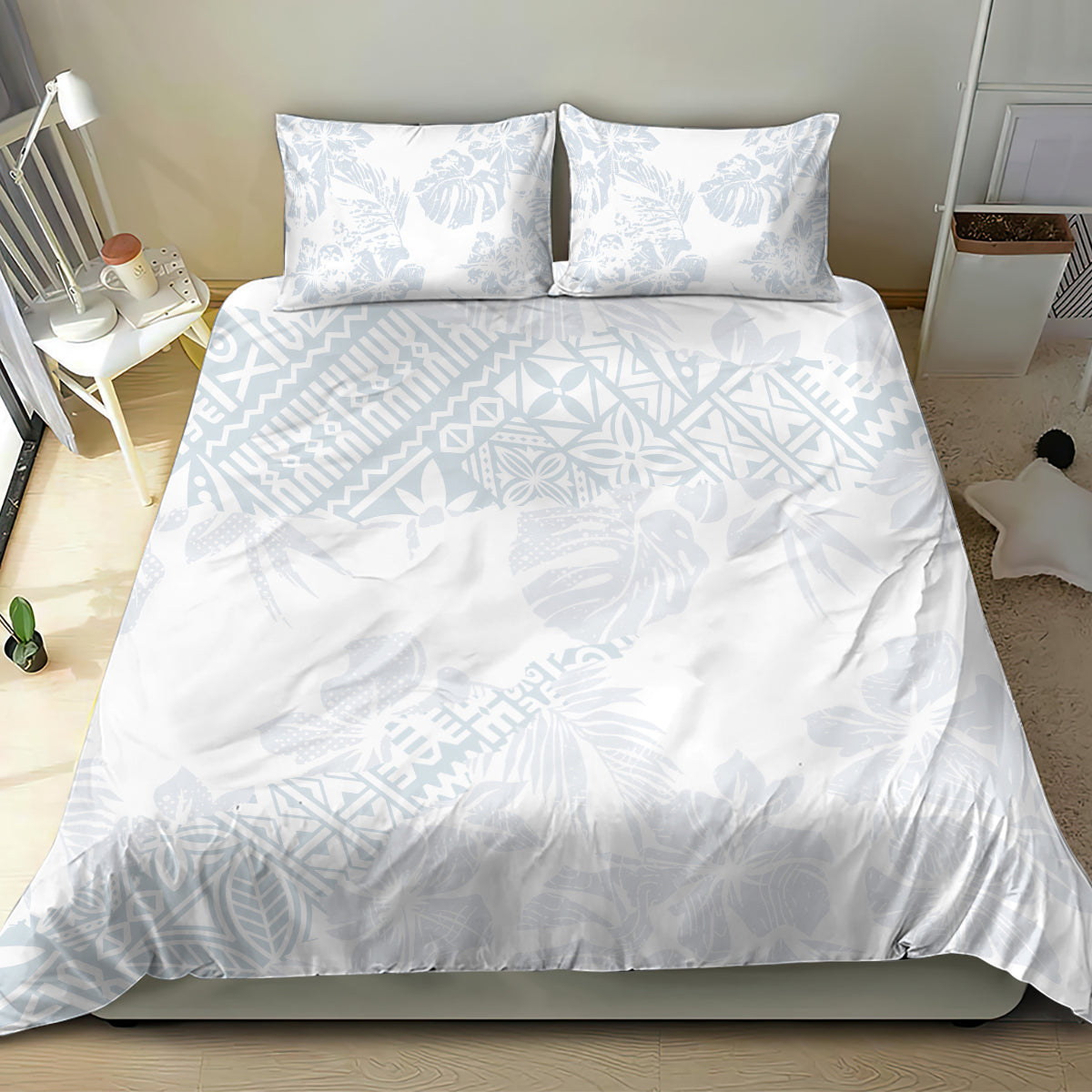 White bedding set with light blue hibiscus leaf print: duvet cover and 2 pillowcases