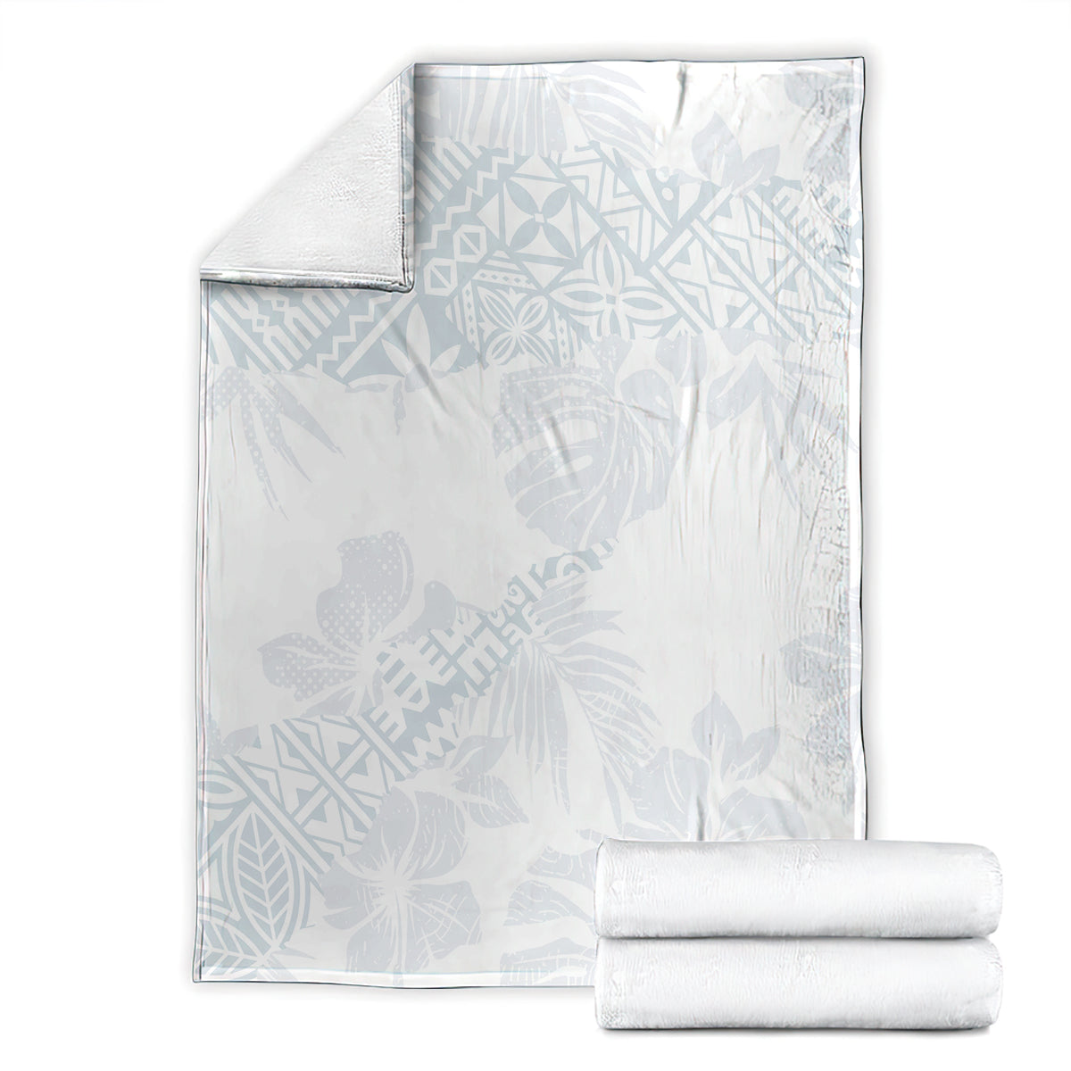 White blanket set with light blue leaf and hibiscus pattern, folded with extra roll