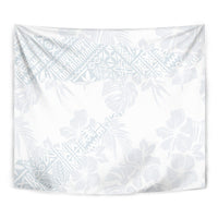 White square tapestry featuring a light blue hibiscus and leaf pattern, front view.